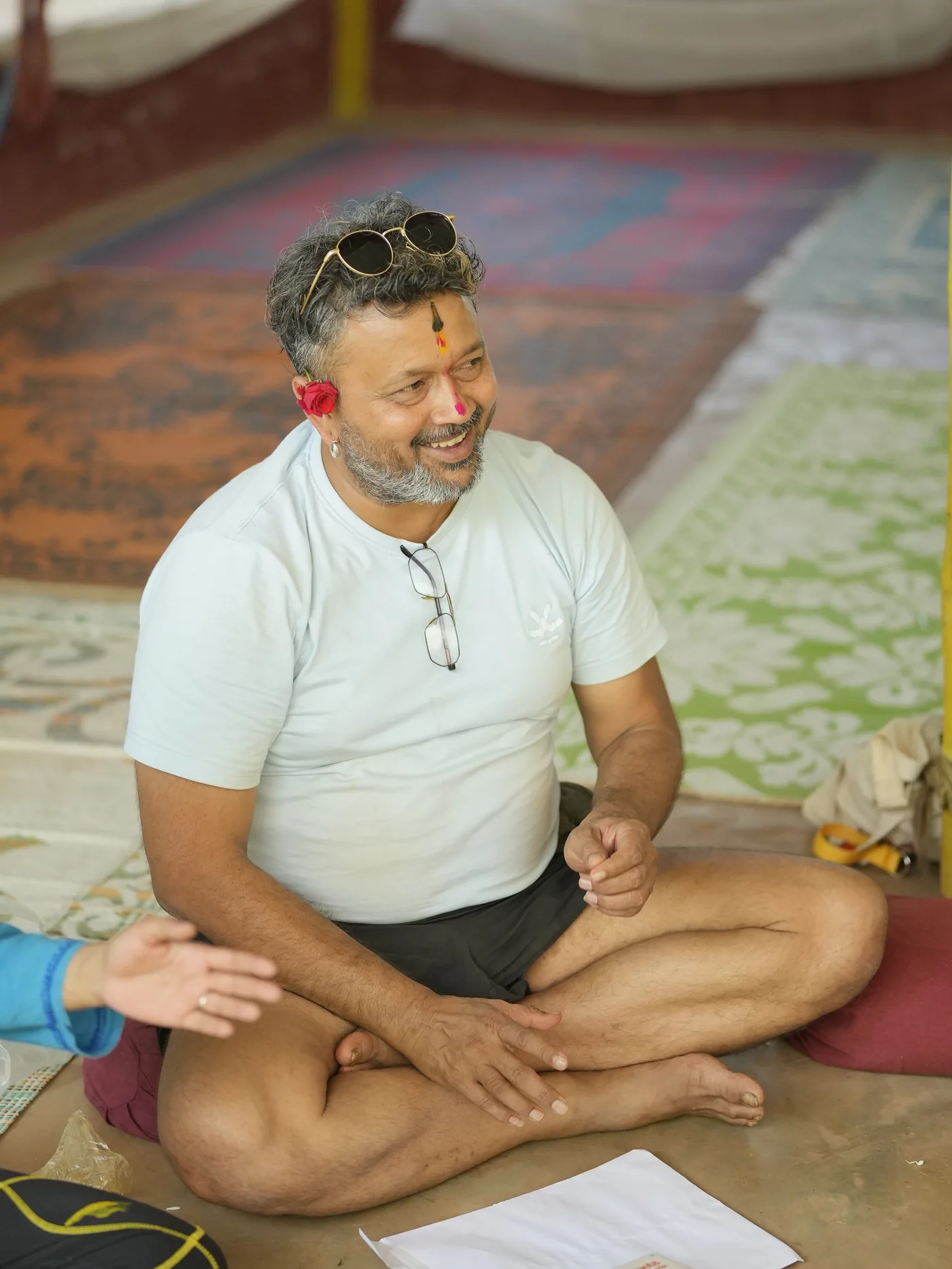 Alpesh Patwari, founder and lead teacher of Alpesh Yoga, seated in the shala